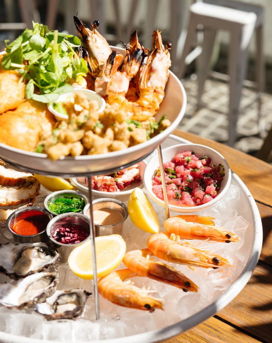 A tantalizing plate of seafood delicacies displayed on a table in a Perth CBD restaurant.