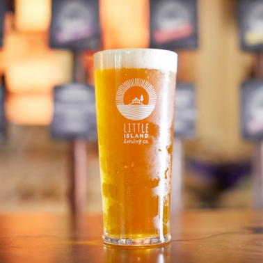 A pint of beer on a table at a bar in Perth brewery.