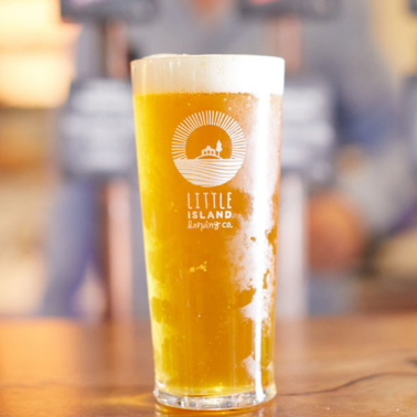 A small island beer glass with the logo of a brewery in Perth.